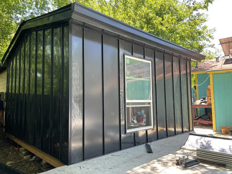 Black standing seam metal wall panels for Roof Inspection in Meriden