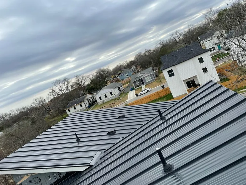 Standing seam metal roof panels with vents for Skylight Repair in Meriden